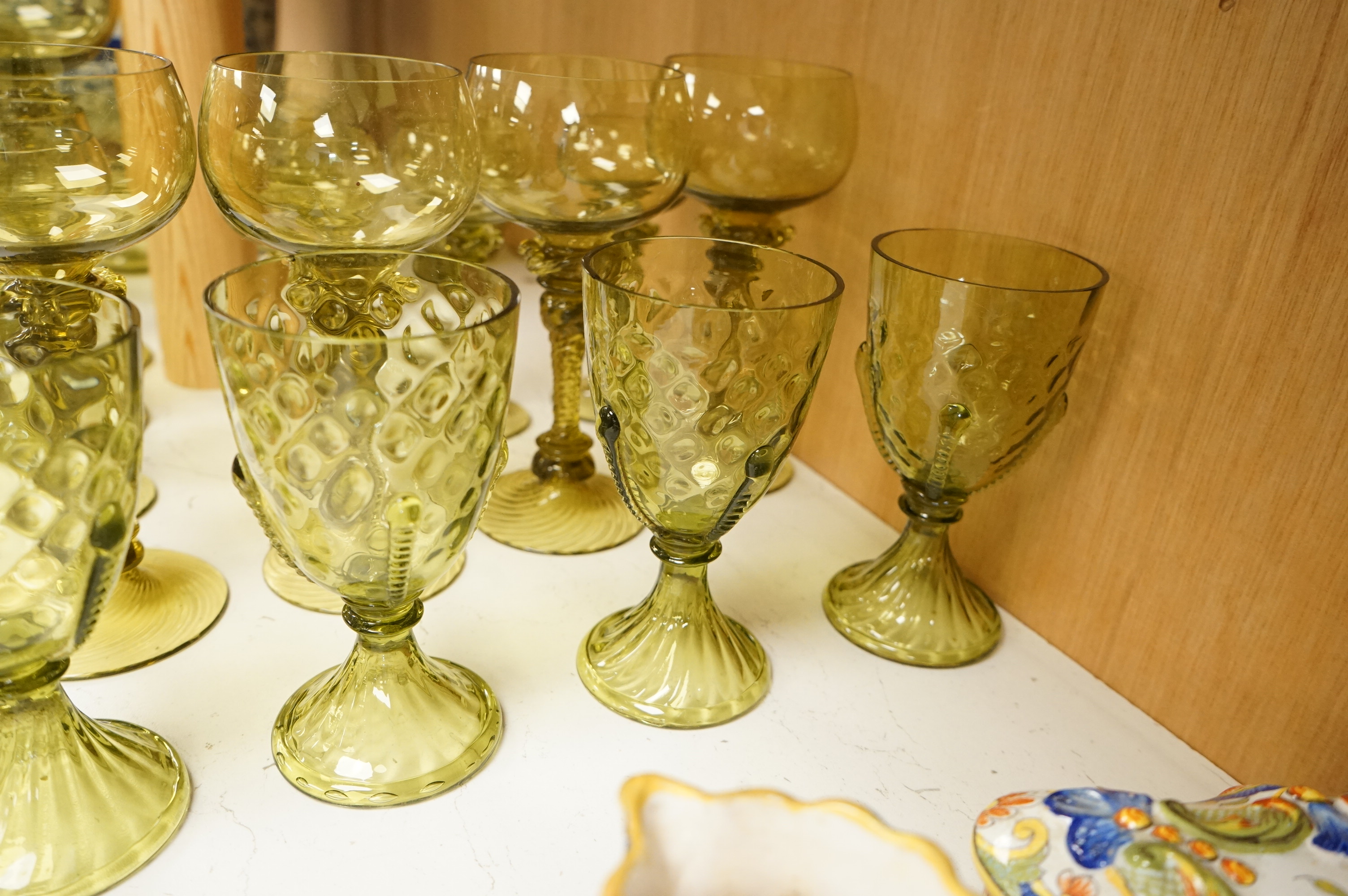 A collection of Continental green glassware to including hock glasses and tumblers, largest 17cm high